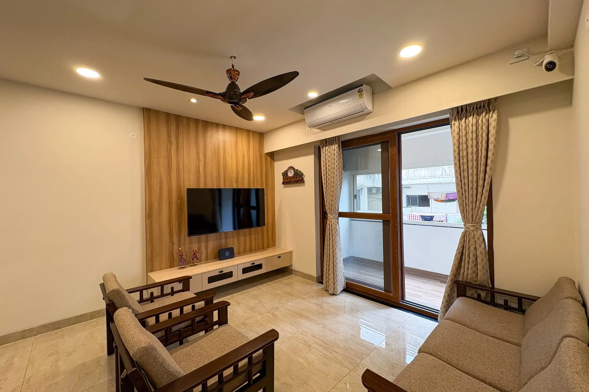 Living room TV wall with wooden panelling, Ramaniyam Abbotsbury, Alwarpet, Chennai