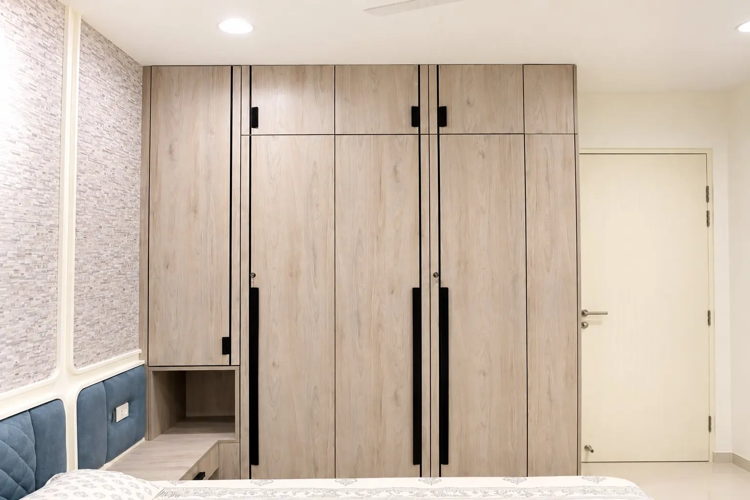 Wood-finish wardrobe with black handles, Hiranandani, OMR, Chennai