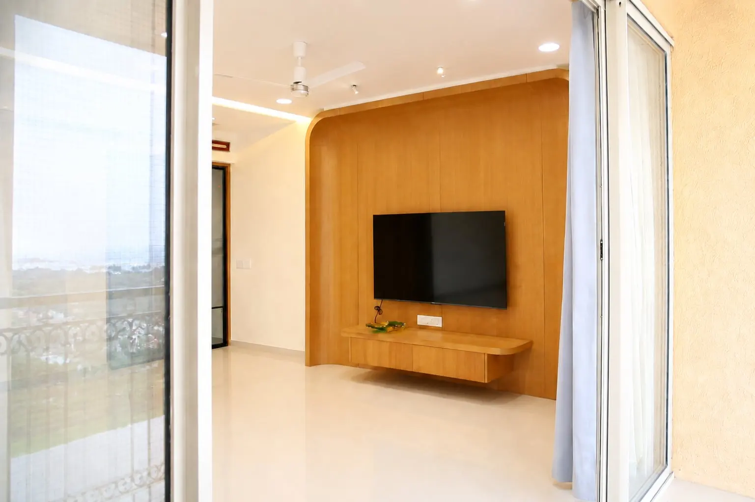 Living room TV wall in wood finish, Hiranandani, OMR, Chennai